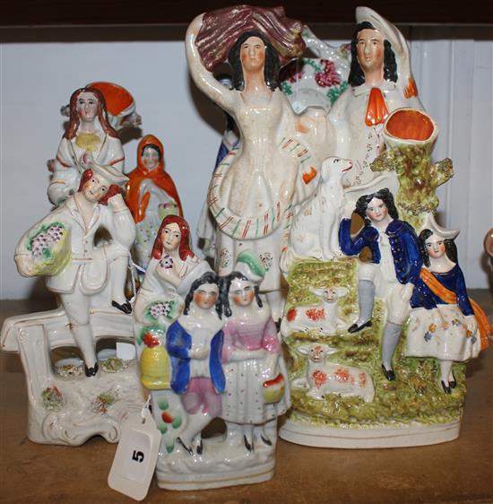 Staffordshire clock flatback figural group & six other groups and figures, various (7)